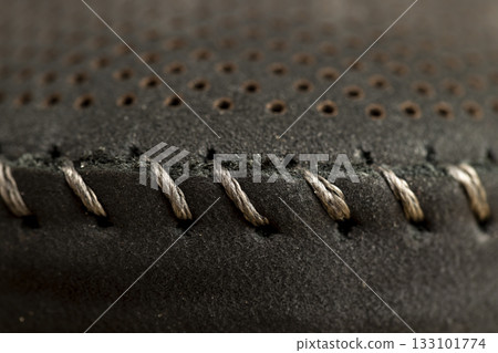 dark smooth perforated leather for shoe production , a large number of equal holes in leather for shoe production dark smooth perforated leather for shoe production , a large number of equal holes in leather for shoe production 133101774
