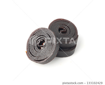Fruit leather rolls isolated. Plum apple pastila, pastille healthy candy snack 133102429