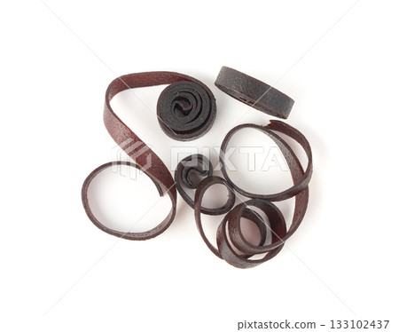 Fruit leather rolls isolated. Plum apple pastila, pastille healthy candy snack 133102437