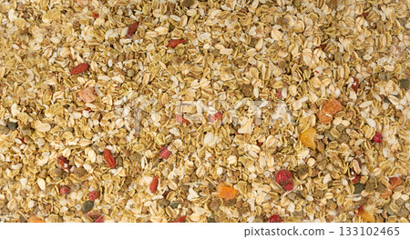 Muesli isolated. Crunchy granola with cereal mix, oat flakes, dry fruits, berries and fiber 133102465