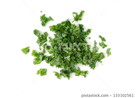 Pieces of kale cabbage leaves isolated. Green leaf of curly cabbage cooked for fresh salad 133102561