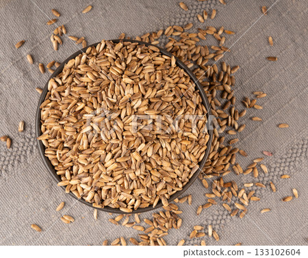 Milk thistle seeds, silybum marianum grains, dry blessed milkthistle fruits, variegated thistle kernels Milk thistle seeds, silybum marianum grains, dry blessed milkthistle fruits, variegated thistle kernels 133102604