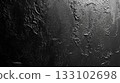 Texture of a black wall coated with tar with a rough texture 133102698