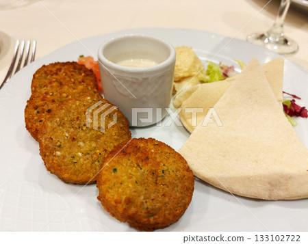 Falafel in Restaurant, Fried Chickpea Round Pieces, Traditional Falafels 133102722