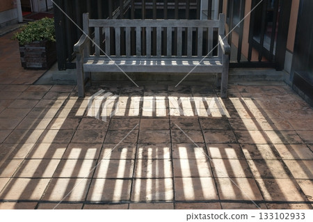 park bench and shadow park bench and shadow 133102933