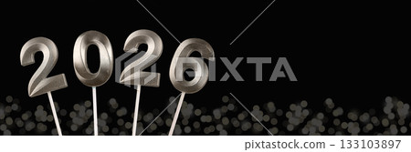 2026 New Year banner. Glossy silver and platinum numbers shining on black background with twinkling 2026 New Year banner. Glossy silver and platinum numbers shining on black background with twinkling 133103897