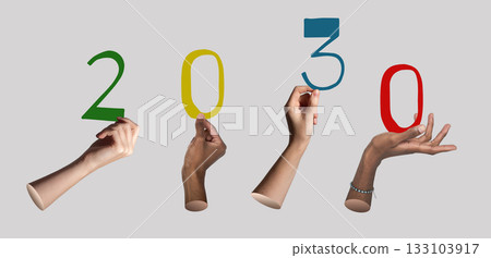 2030 New Year celebration. Diverse hands holding glowing golden numbers, symbol of unity and joy, 133103917