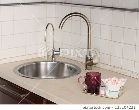 Elegant and efficient kitchen design radiating morning comfort 133104221