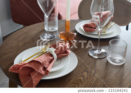 Luxurious dining display with ambient lighting and refined details 133104241