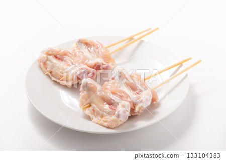 Ikada skewers (chicken wings) before cooking Ikada skewers (chicken wings) before cooking 133104383