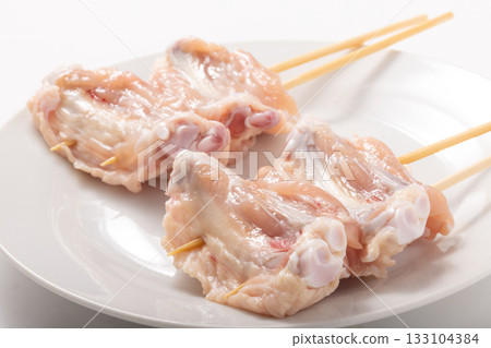 Ikada skewers (chicken wings) before cooking Ikada skewers (chicken wings) before cooking 133104384
