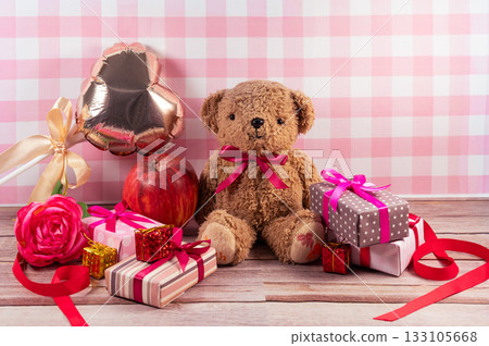 Teddy bear on a gingham background Teddy bear on a gingham background 133105668