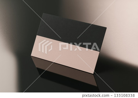 Minimal business card with black and blush pink color block on glossy background. Modern branding mockup for design, identity, or presentation. 133108338