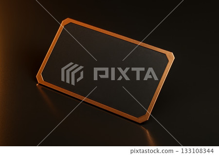 Luxury black business card with copper metallic frame on dark background. Elegant mockup for premium branding, identity, or invitation. 133108344