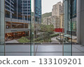 Oct 29 2025 Quarry Bay Streetscape Through Office Lobby Glass 133109201