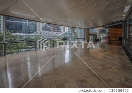 Oct 29 2025 Quarry Bay Streetscape Through Office Lobby Glass Oct 29 2025 Quarry Bay Streetscape Through Office Lobby Glass 133109202