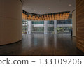 Oct 29 2025 Modern Office Lobby With Glass Walls And Warm Wooden Floors, 133109206