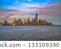 New York City Skyline showing Lower Manhattan and World Trade Center at Sunset 133109390