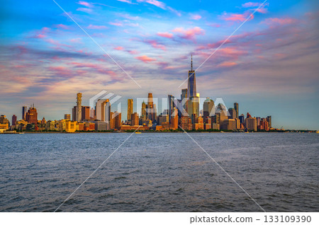 New York City Skyline showing Lower Manhattan and World Trade Center at Sunset 133109390