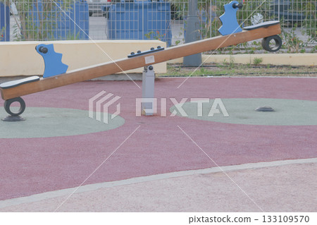 Empty spring rider playground equipment designed for two children to play together Empty spring rider playground equipment designed for two children to play together 133109570