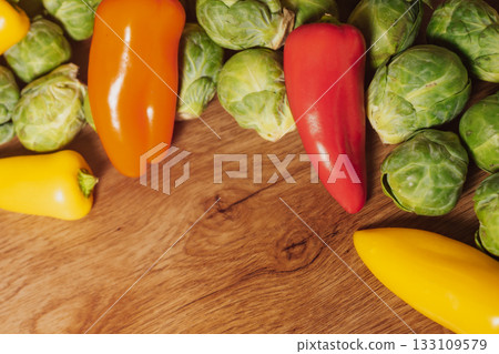 Raw brussel sprouts and mini bell peppers for a healthy, plant-based diet Raw brussel sprouts and mini bell peppers for a healthy, plant-based diet 133109579