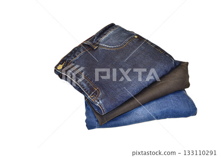 A stack of blue jeans, men's. 133110291