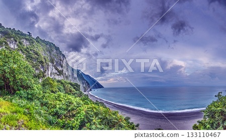 Dramatic Taiwan coastline with steep cliffs and blue sea 133110467