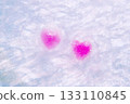 Image of winter snow and two warmly glowing hearts 133110845