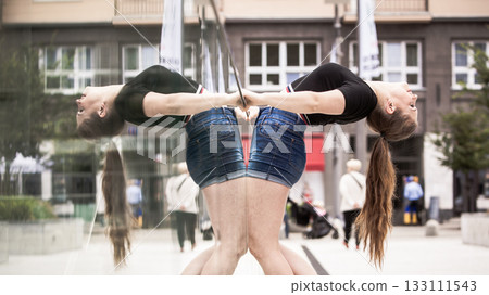 Young woman riding roller skates Young woman riding roller skates 133111543