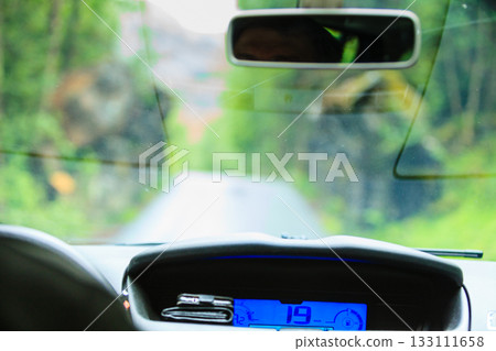 Car driving, view from inside on dashboard Car driving, view from inside on dashboard 133111658