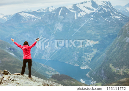 Tourist woman on Dalsnibba viewpoint Norway 133111752