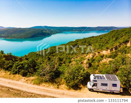 Camping car at lake Sainte Croix in Verdon Gorge, France Camping car at lake Sainte Croix in Verdon Gorge, France 133111794