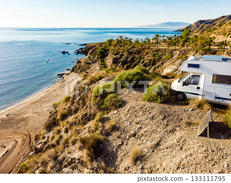 Caravan camping on sea shore, Spain. Caravan camping on sea shore, Spain. 133111795