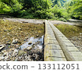 A wooden bridge over a stream on Mt. Rokko 133112051