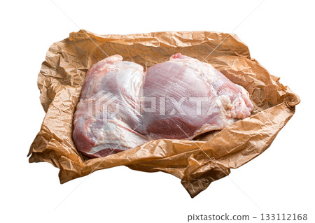 Isolated raw turkey thigh on paper 133112168