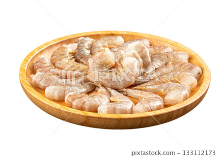 Isolated raw shrimp arranged on wooden plate 133112173