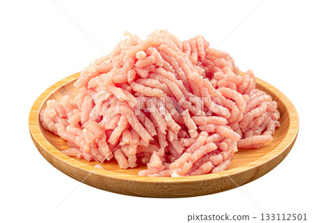 Isolated raw ground chicken on wooden plate 133112501
