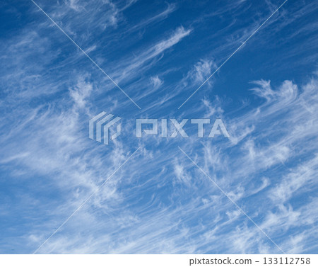 A sky with beautiful curly clouds A sky with beautiful curly clouds 133112758