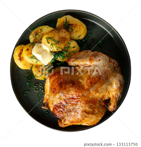 Isolated roasted turkey with potatoes on plate 133113750