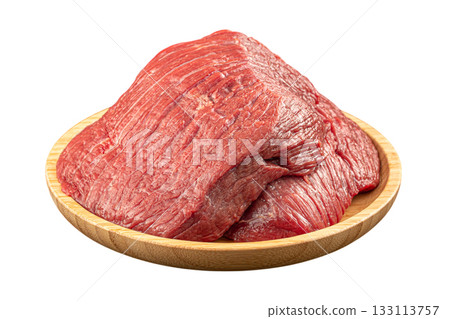 Isolated raw beef pieces on wooden plate Isolated raw beef pieces on wooden plate 133113757