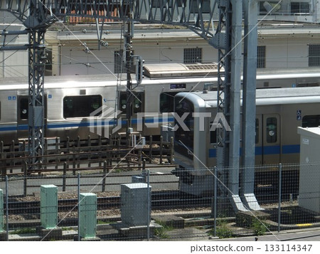 Trains running side by side Trains running side by side 133114347