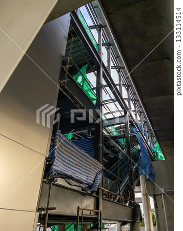 Urban Transit Station Construction with Escalator Installation. 133114514