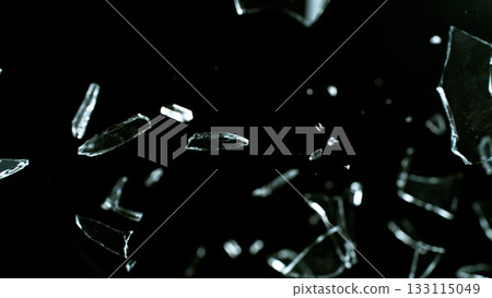 Freeze Motion Shot of Breaking Real Glass Isolated on Black Background Freeze Motion Shot of Breaking Real Glass Isolated on Black Background 133115049