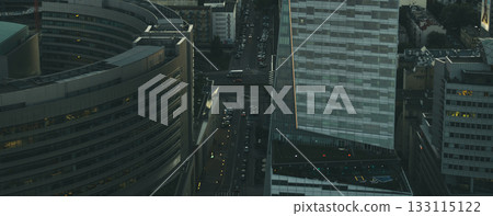 WARSAW, POLAND - MAY 07, 2018. Dark mood arial view of city street. Aerial city view at night WARSAW, POLAND - MAY 07, 2018. Dark mood arial view of city street. Aerial city view at night 133115122