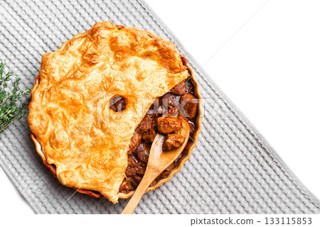 Beef steak pie with dark beer gravy and crispy puff pastry Beef steak pie with dark beer gravy and crispy puff pastry 133115853