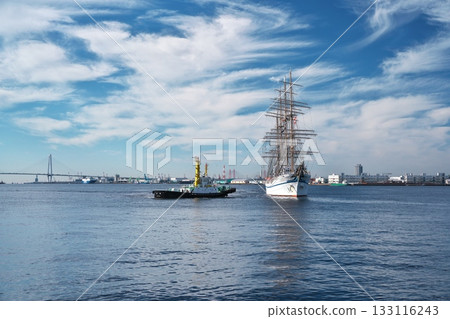 Nippon Maru being pushed by a tugboat to dock at Garden Pier. 133116243