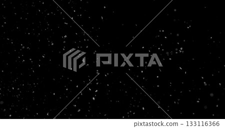 Falling snowflakes isolated on black background. Winter snow overlay texture for VFX, compositing, motion graphics and atmospheric effects 133116366