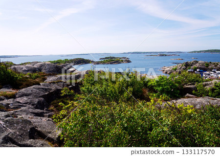 Ships harbour at Saltholmen peninsula on the shore of Alvsborgsfjorden, harbour for archipelago ships, Alvsborg district,  sunny day, Gothenburg, Sweden 133117570