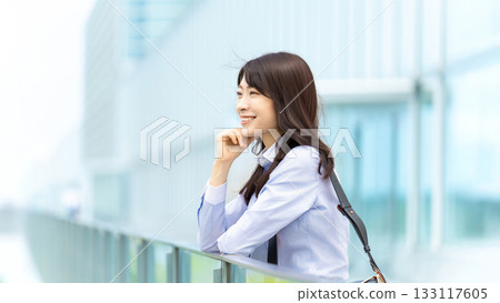 A woman/businesswoman gazing into the distance A woman/businesswoman gazing into the distance 133117605