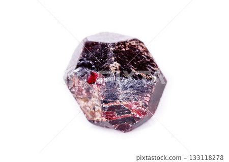 Macro of a mineral garnet stone on a white background 133118278